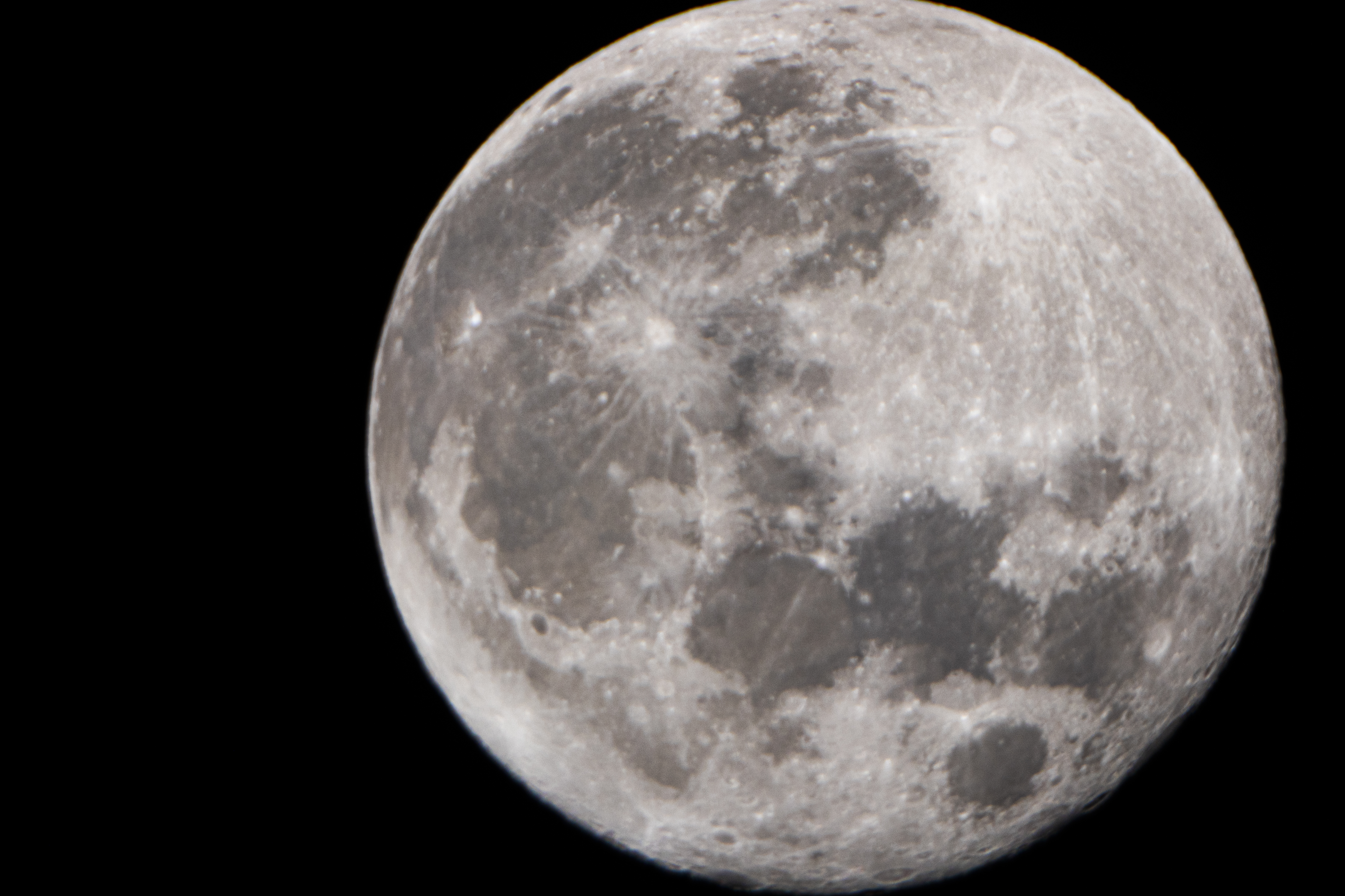 Detailed full moon against a black sky