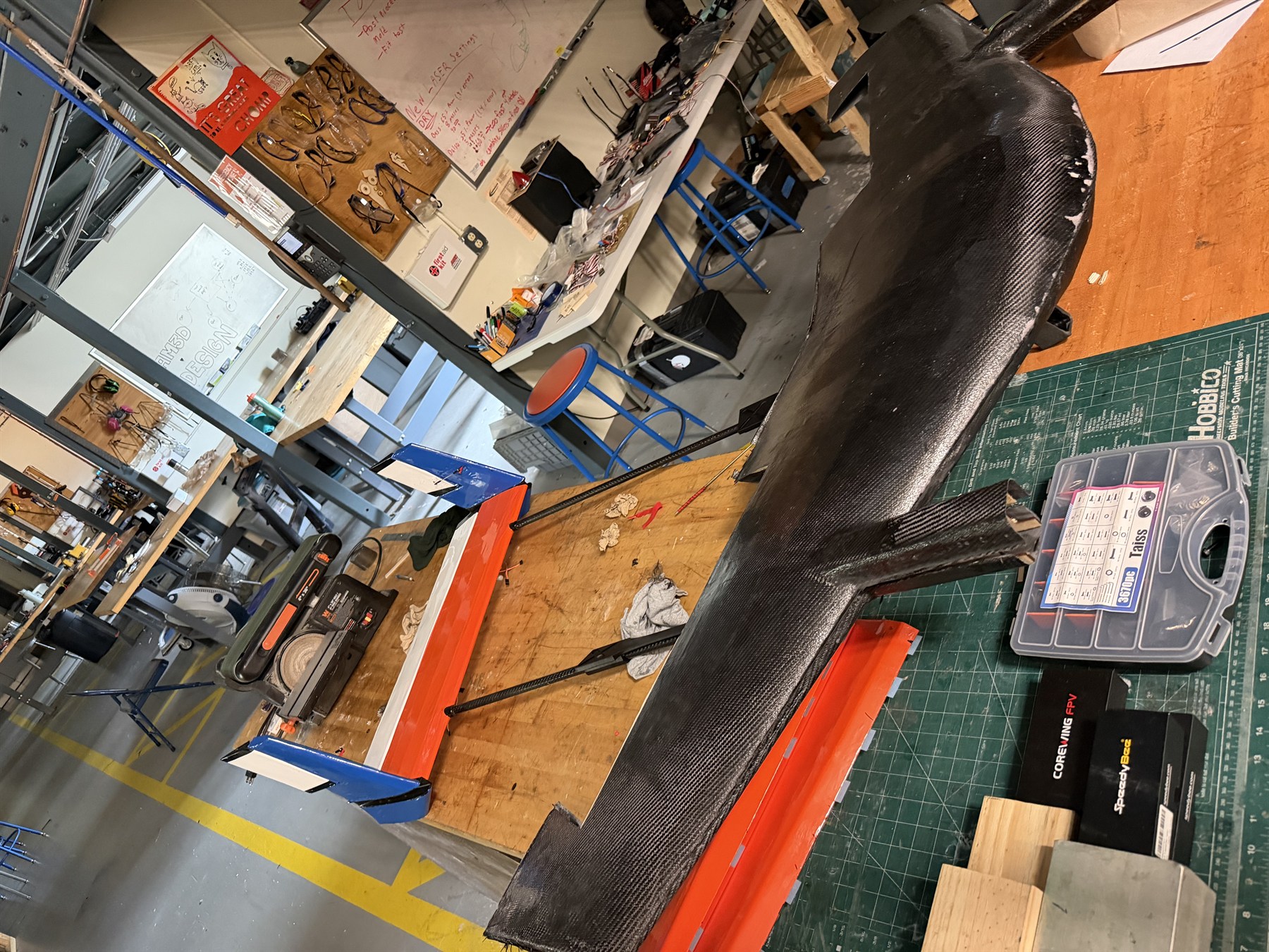 Carbon fiber fuselage and structure of a VTOL aircraft for Design Build Fly