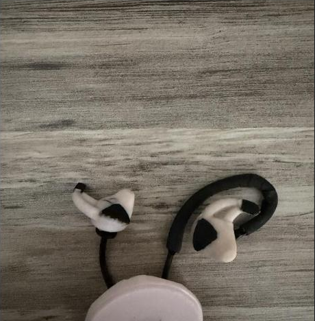 Silicone ear piece prototypes for the Evren Phoenix device on a workbench